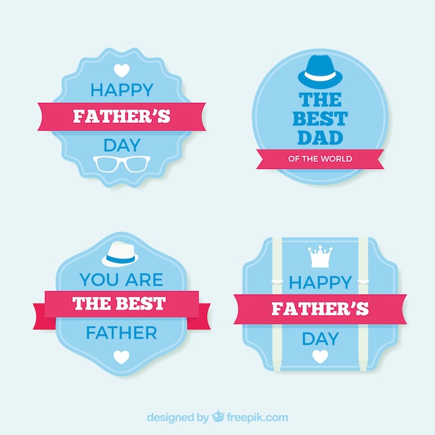 Assortment of blue stickers with pink ribbons for father's day