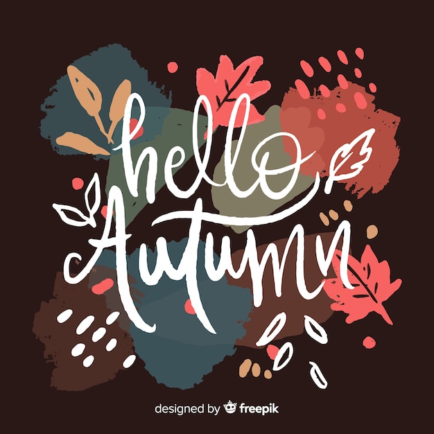 Free Vector autumn lettering background hand drawn design