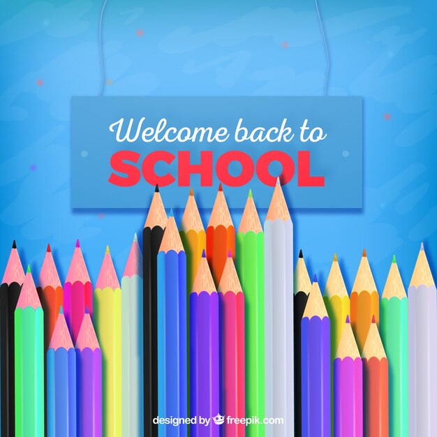 Back to school background with colored pencils