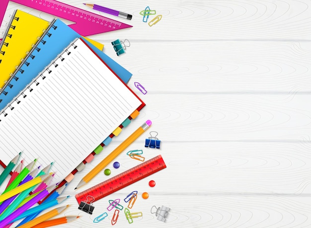 Free Vector back to school realistic background with colorful stationary on wooden surface