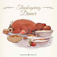 Free vector background of delicious thanksgiving dinner with turkey in watercolor effect