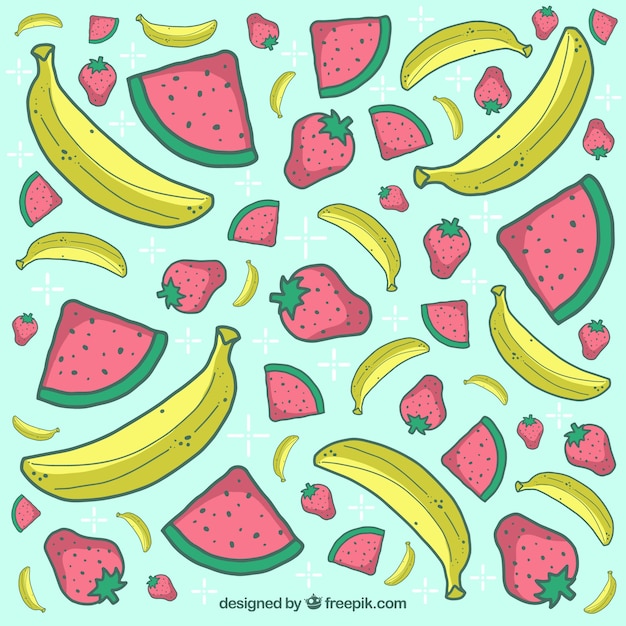 Free Vector background of hand drawn bananas with watermelon and strawberries