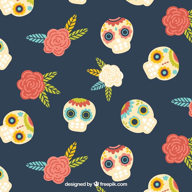 Free vector background of hand drawn mexican skulls with roses