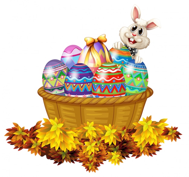 Free vector a basket full of easter eggs and a bunny