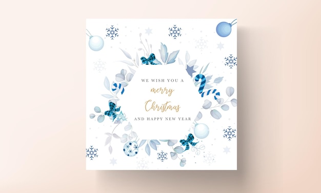 Free vector beautiful christmas card template with white and blue christmas ornaments