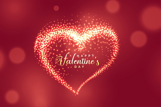 Free vector beautiful glowing sparkles heart background