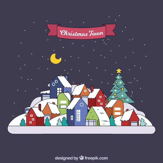 Free Vector beautiful hand drawn christmas city background