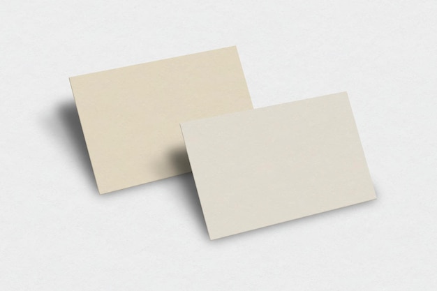 Free Vector blank business card mockup in light gold tone with front and rear view