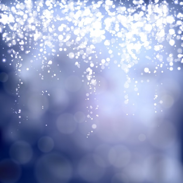 Free vector blue blurred background with sparkling lights