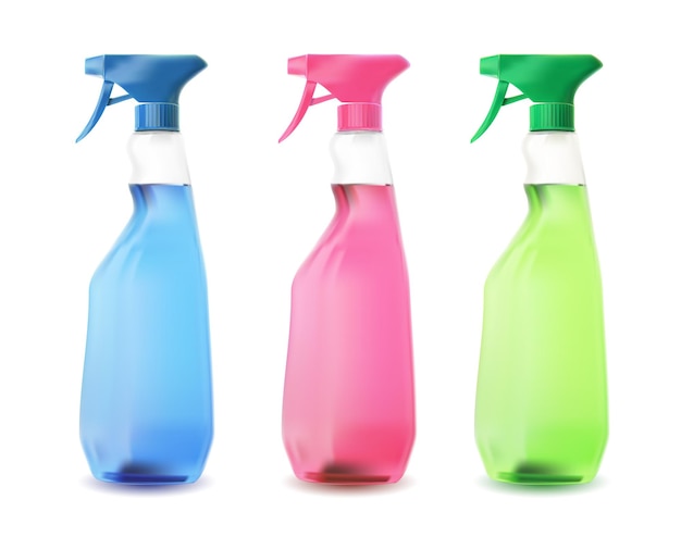 Blue, pink and green spray bottles on white.