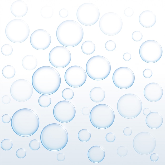 Blue soap water bubbles floating on white background