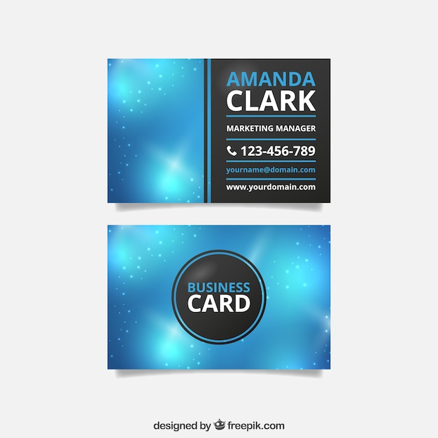 Blue visiting card with shiny shapes