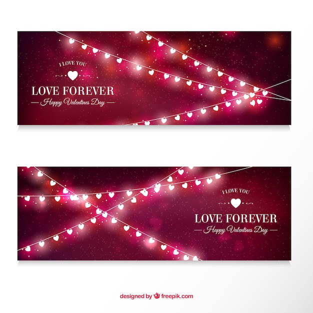 Free vector blurred banners with lights for valentine's day