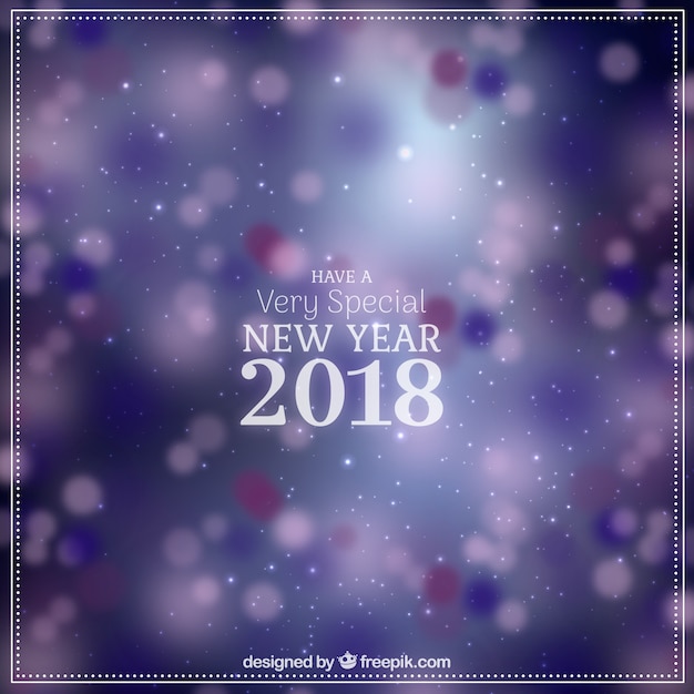 Blurred new year 2018 background in purple