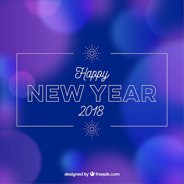 Blurred new year background in blue and purple