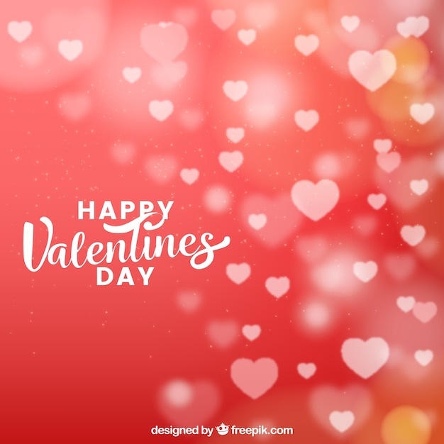 Free Vector blurred valentine's day background in orange