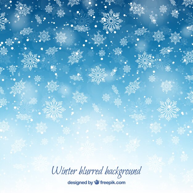 Blurred winter background with snowflakes