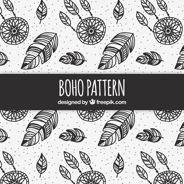 Free vector boho pattern with black feathers