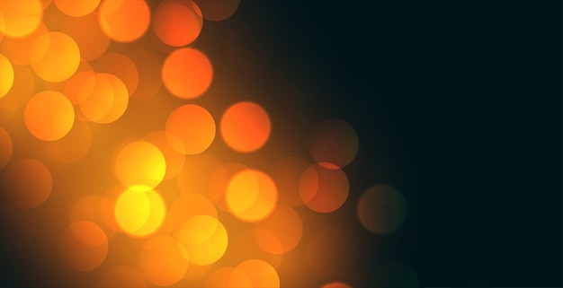 Free Vector bokeh background design with yellow light effect