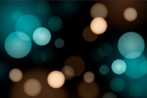 Free Vector bokeh gradient blue lights on dark background