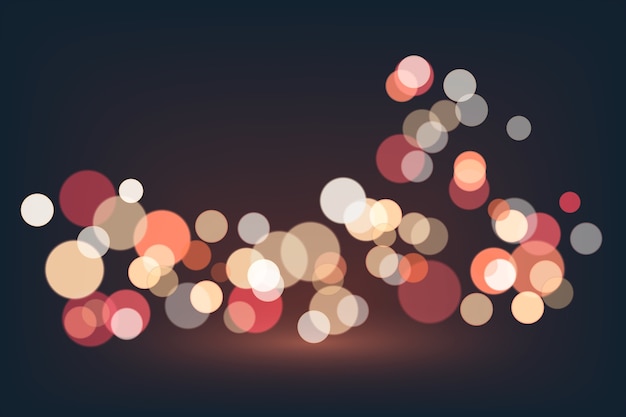 Free vector bokeh lights effect on dark background