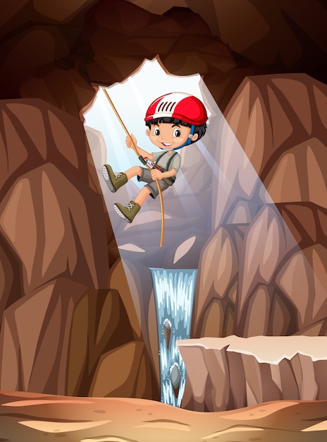 Free Vector boy abseiling into cave