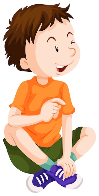 Boy in orange shirt sitting