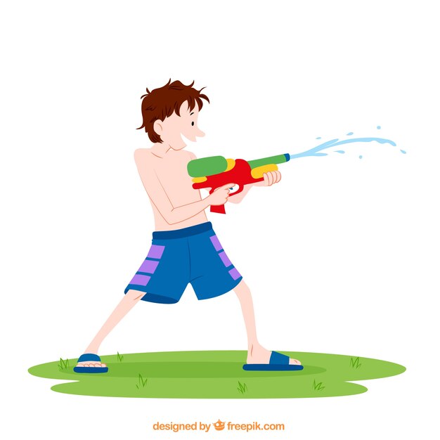 Boy playing with water gun