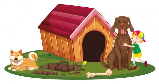 Boy and two dogs by the doghouse