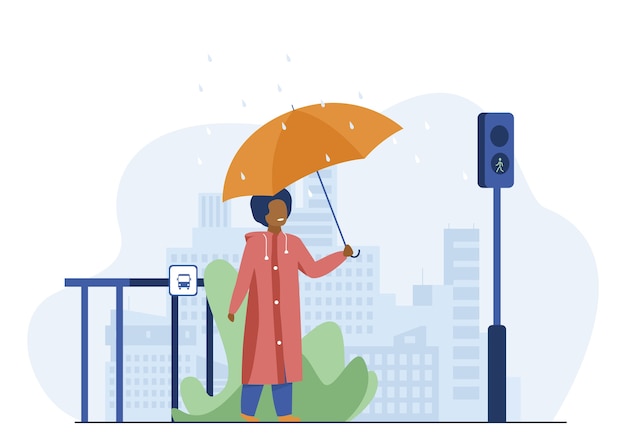 Free Vector boy with umbrella crossing road in rainy day. city, pedestrian, traffic lights flat vector illustration. weather and urban lifestyle