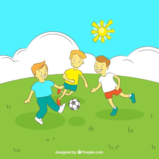 Boys playing football on a field