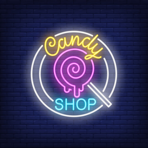 Candy shop neon sign. Pin-up lollipop on stick in circle on brick wall.