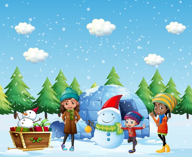 Children with igloo and snowman in winter