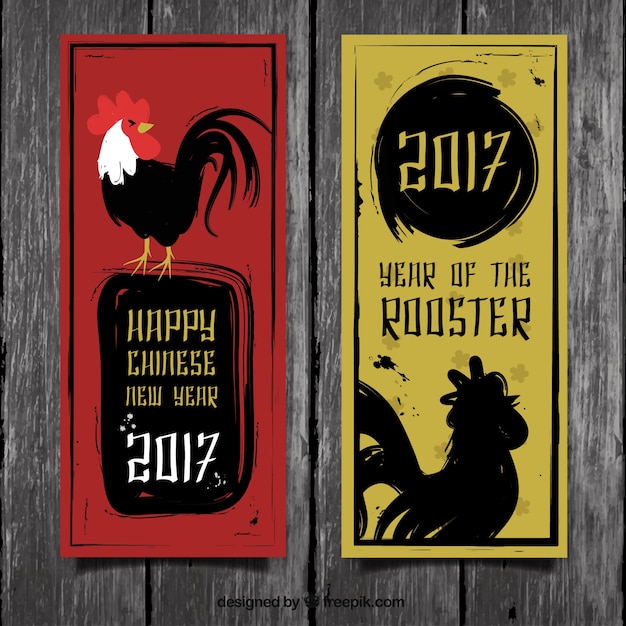 Free Vector chinese new year banners with ink roosters