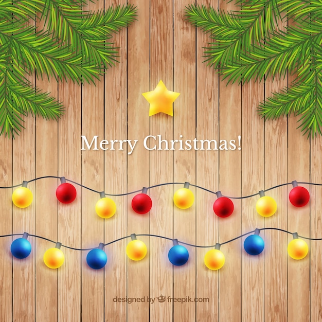 Free Vector christmas balls on wooden background