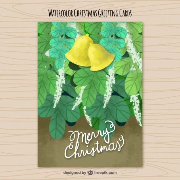 Christmas card with watercolor leaves and bells