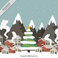 Free vector christmas landscape with snowy mountains in flat design