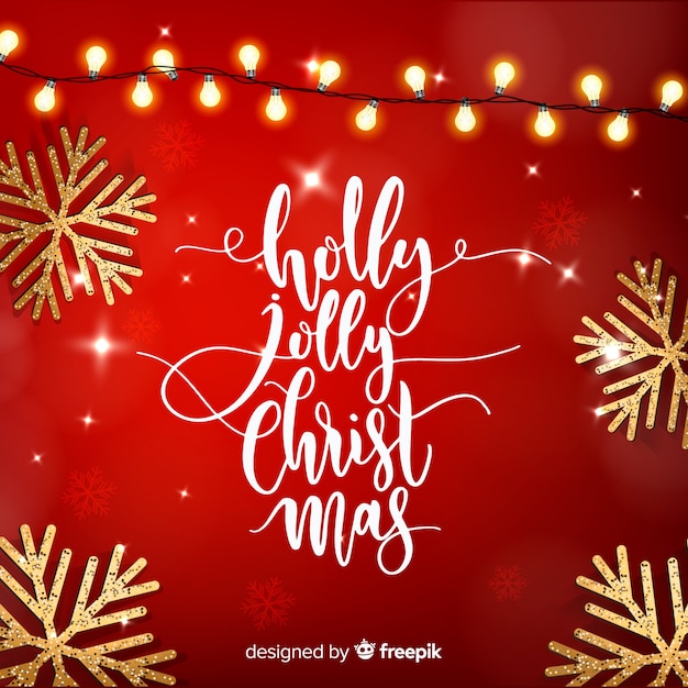 Free Vector christmas lettering with realistic elements