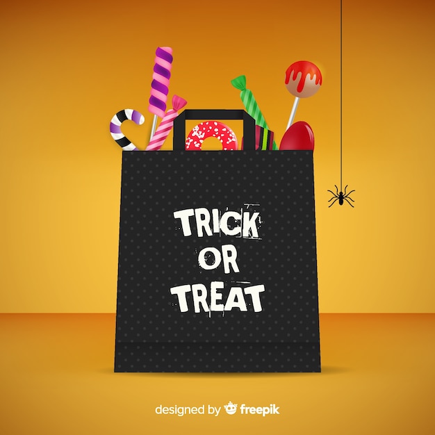 Free Vector colorful halloween candy bag background in flat design