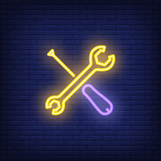 Crossed screwdriver and wrench on brick background. Neon style illustration.