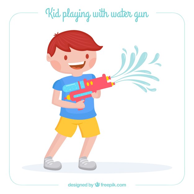 Cute boy playing with water gun