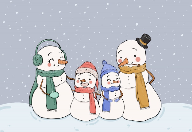 Cute snowmen family staying in the snow