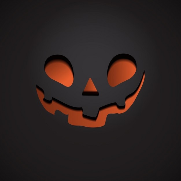 Free Vector dark background with pumpkin face