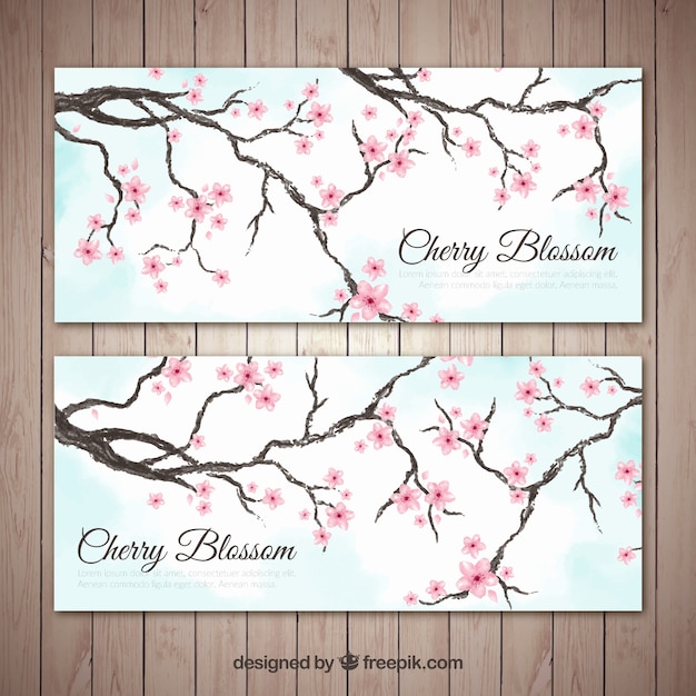 Free vector decorative banners with blooming branches