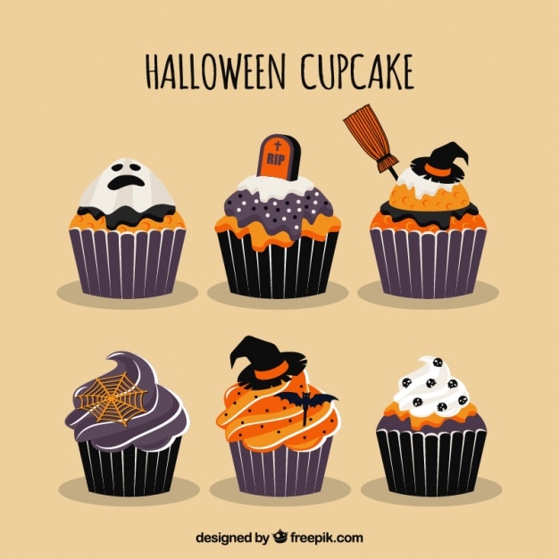 Free Vector delicious muffins with halloween elements