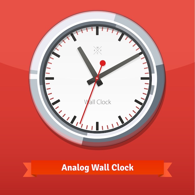 Free Vector designer wall clock in a metal casing