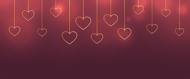 Free Vector elegant golden hanging hearts with text space for valentines day