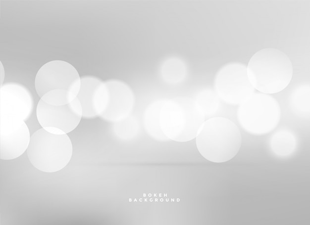 Free vector elegant white lights bokeh background