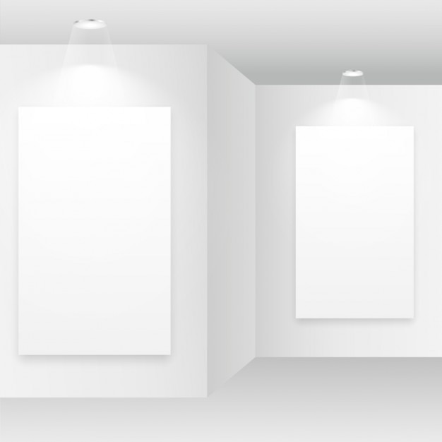 Empty white room with picture frames