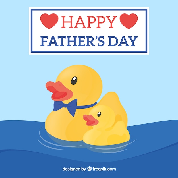 Father's day background with plastic ducks